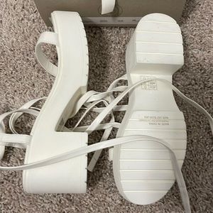 New platform wrapped around sandals from urban with box